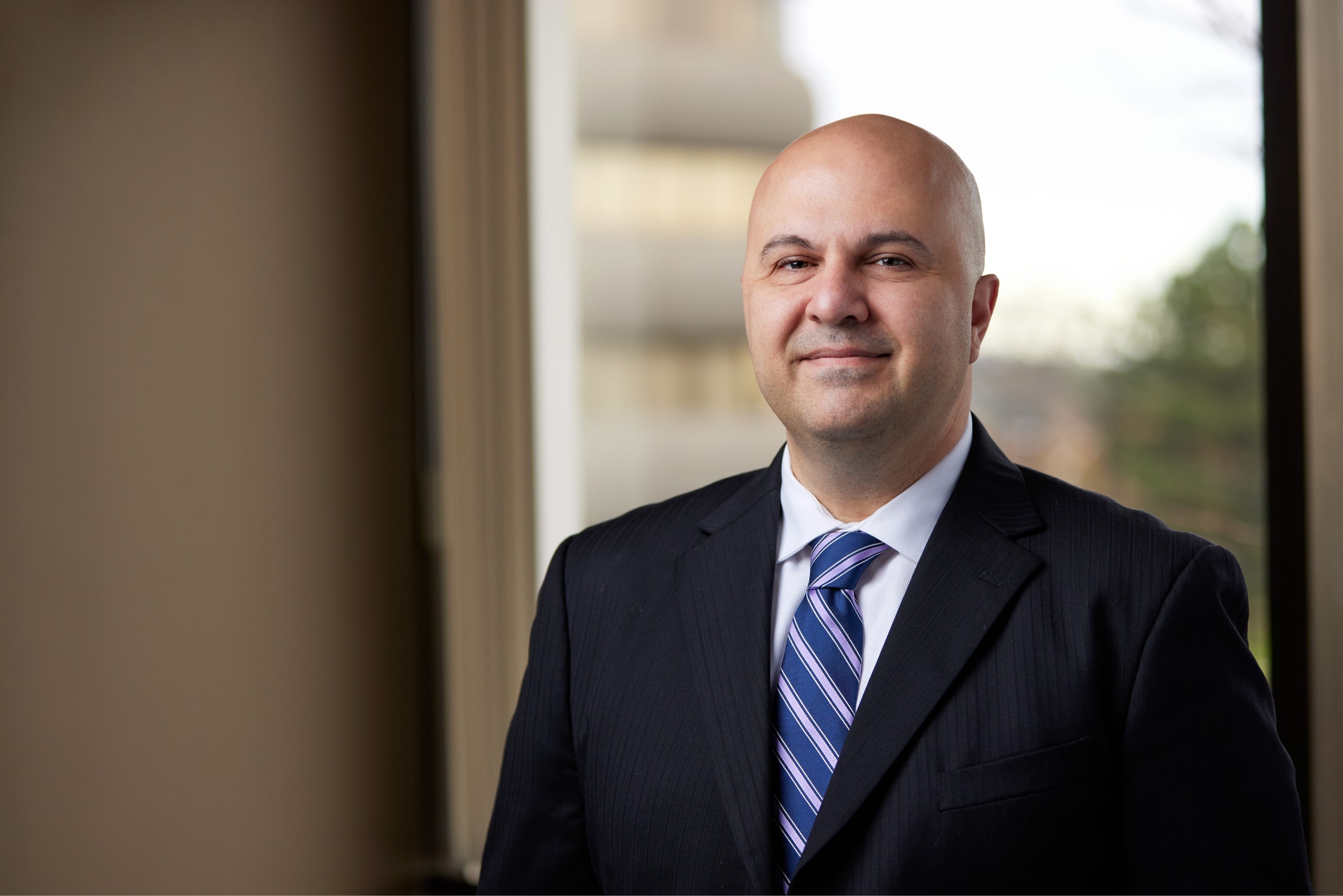 An image of Anthony Falco CPA in front of a window in Oakville