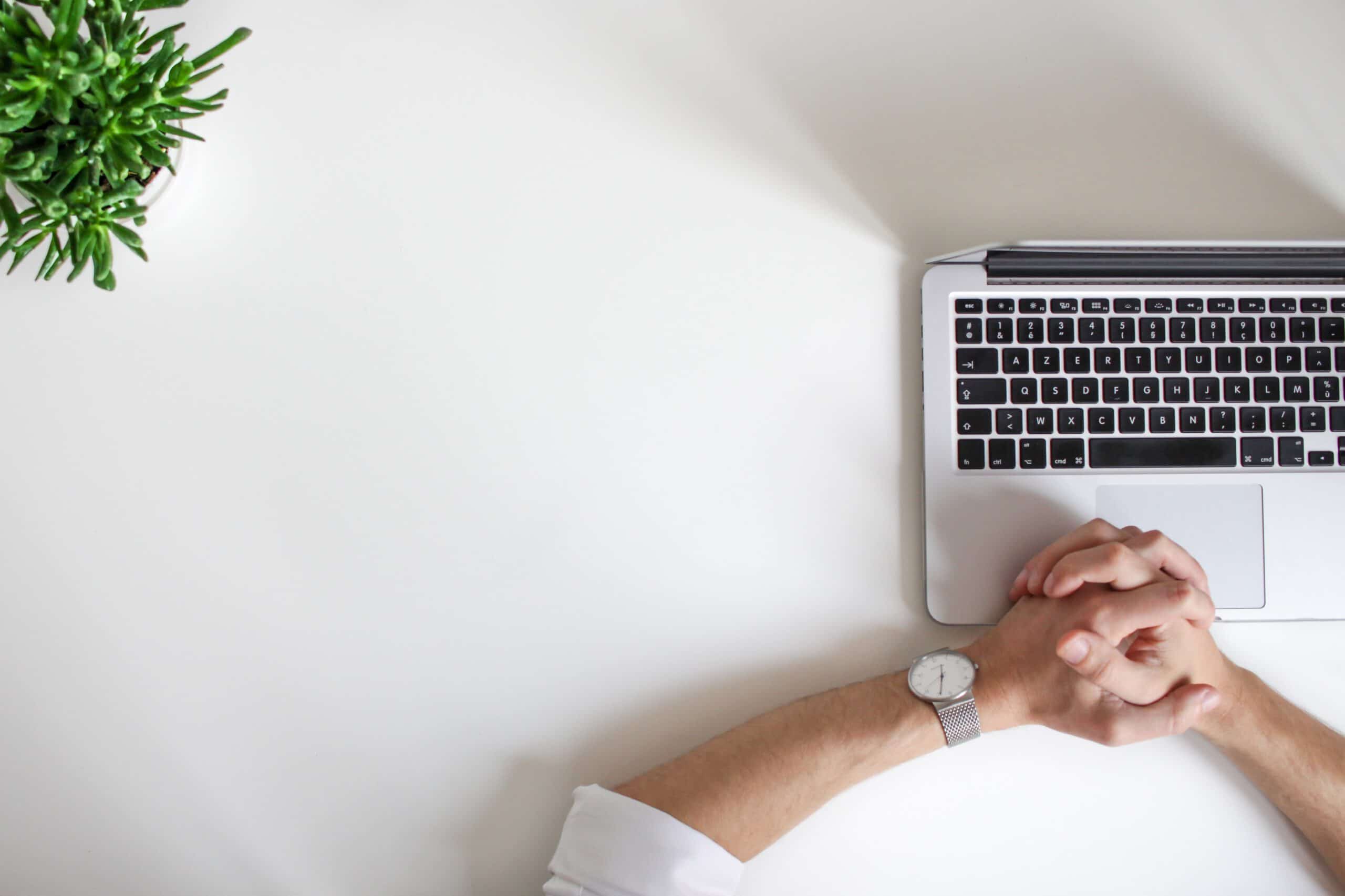 An image of an Oakville accountant sitting at his desk