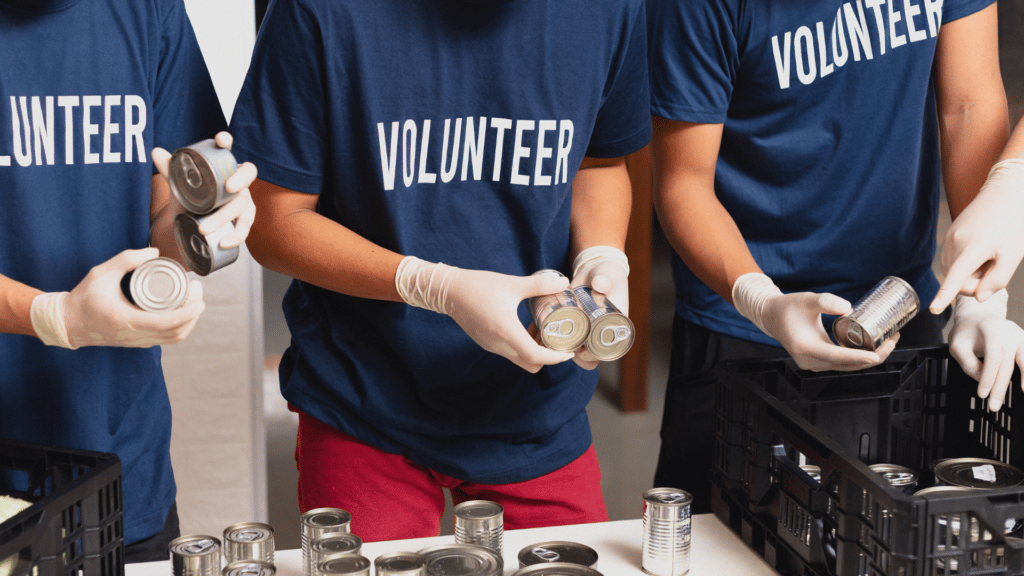 An image of three volunteers at a not for profit charity