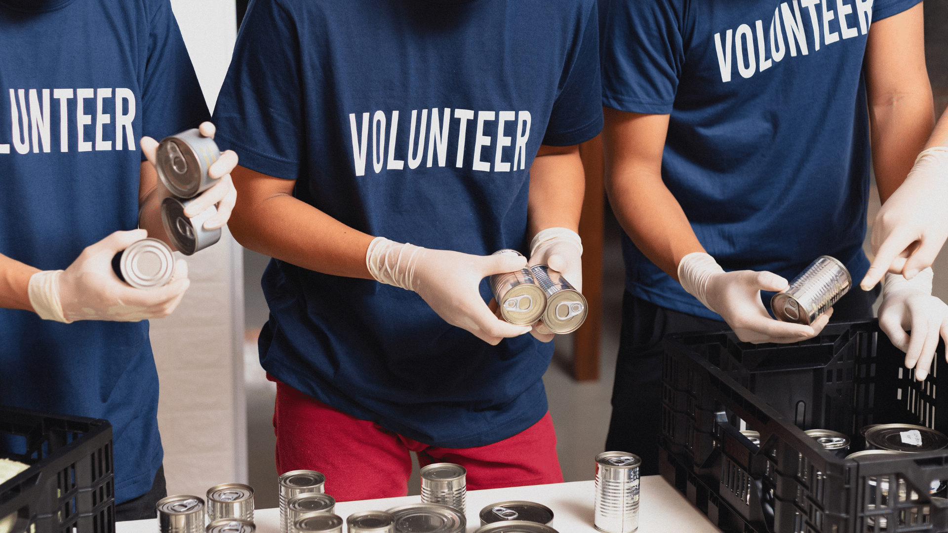 An image of three volunteers at a not for profit charity