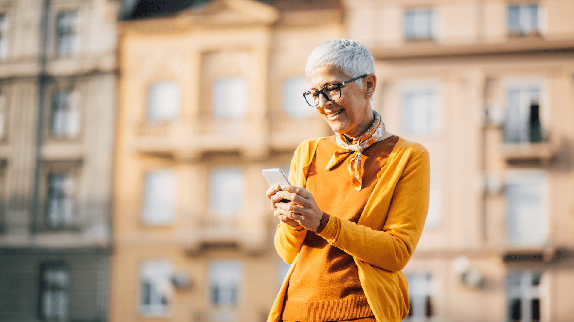 An image of a small business owner reviewing her Estate Plan on the phone