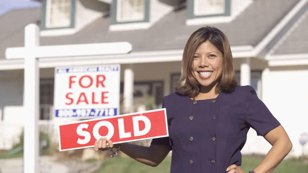 An image of a real estate agent who recently set up her personal real estate corporation (PREC)
