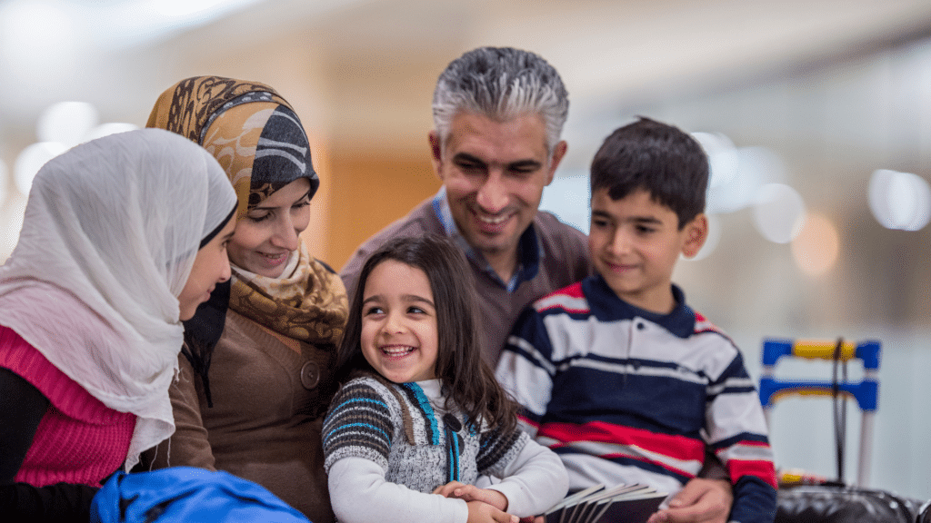 An image of a family that has recently immigrated to Canada and are evaluating the FHSA