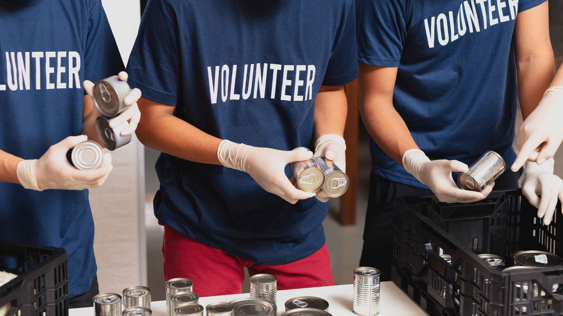 An image of three volunteers working at a local Oakville Not-for-profit organization