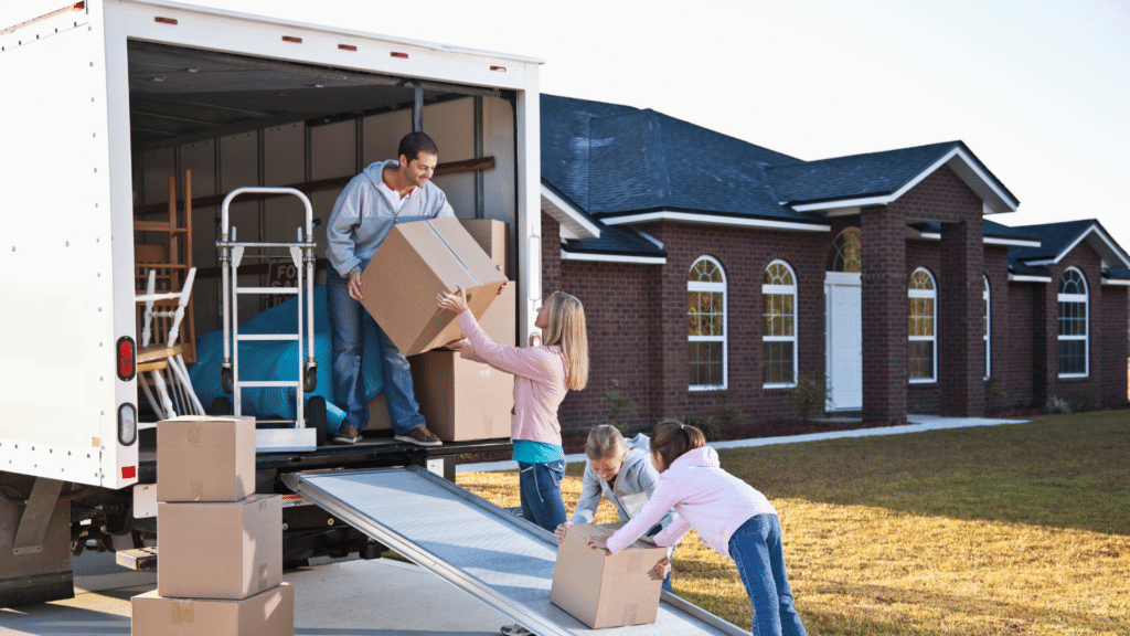 An image of a family in Oakville moving boxes into a truck