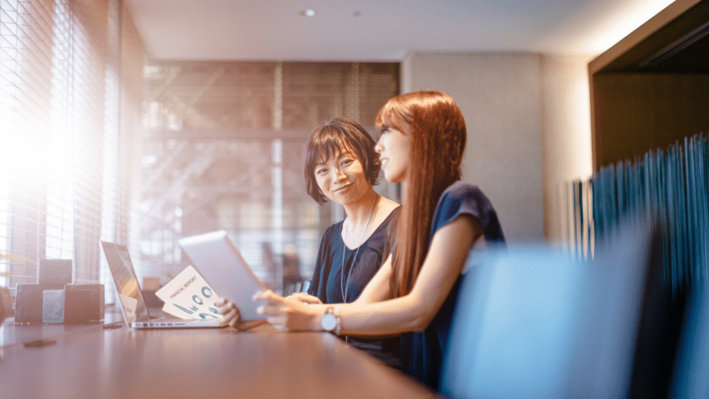 An image of a CFO discussing working capital with her client.