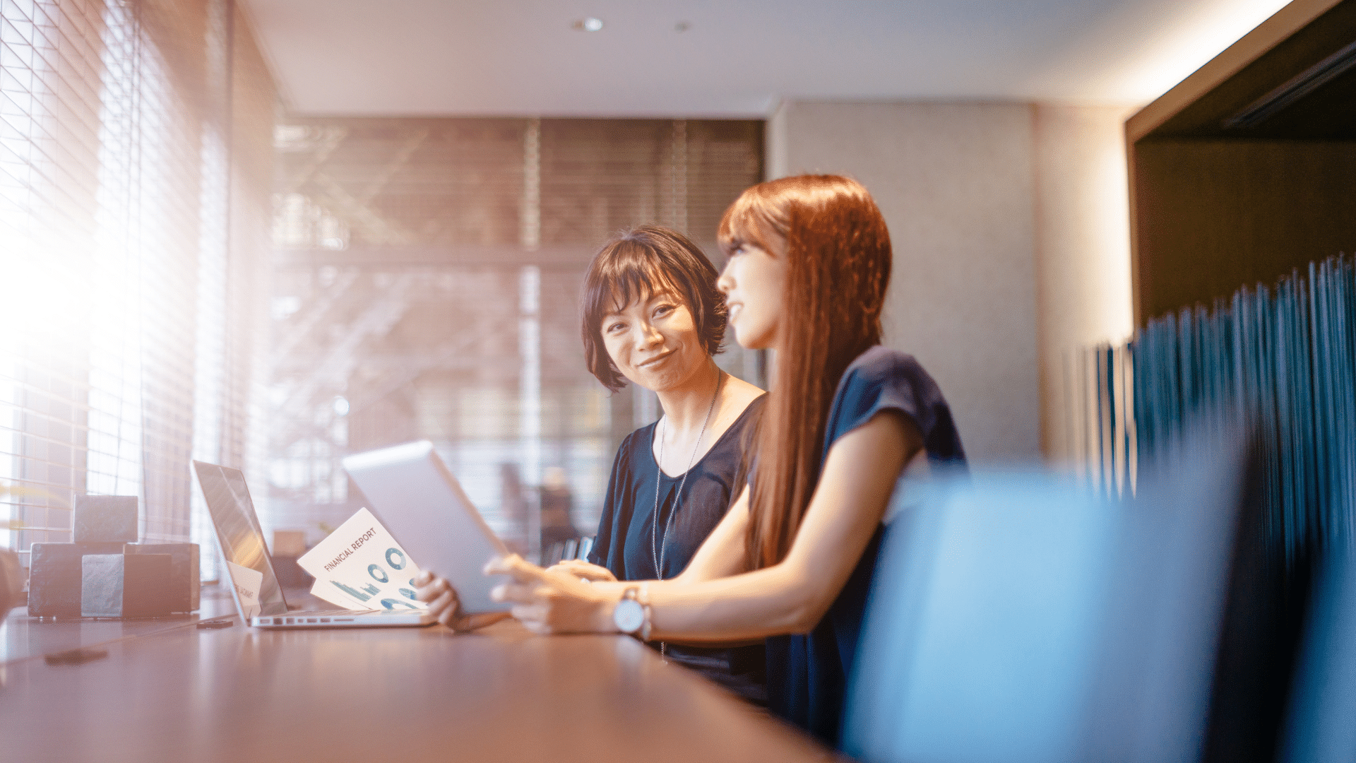 An image of a CFO discussing working capital with her client.