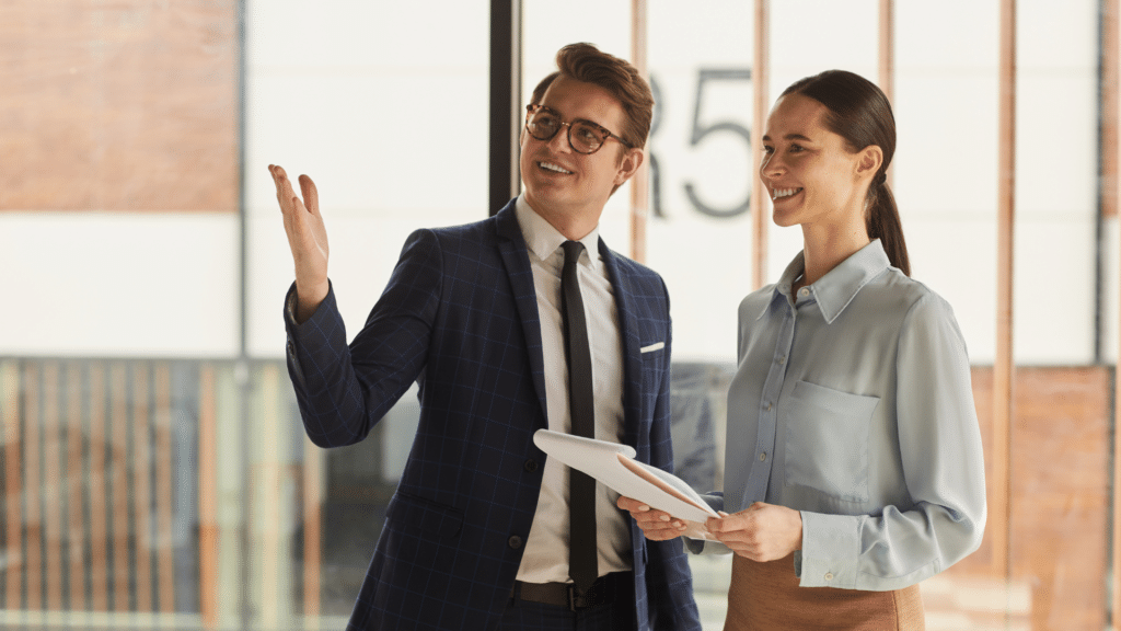 An image of a small business owner discussing selling their commercial property