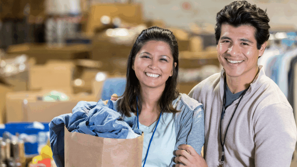 An image of two oakville accountants volunteering at a local non profit organization