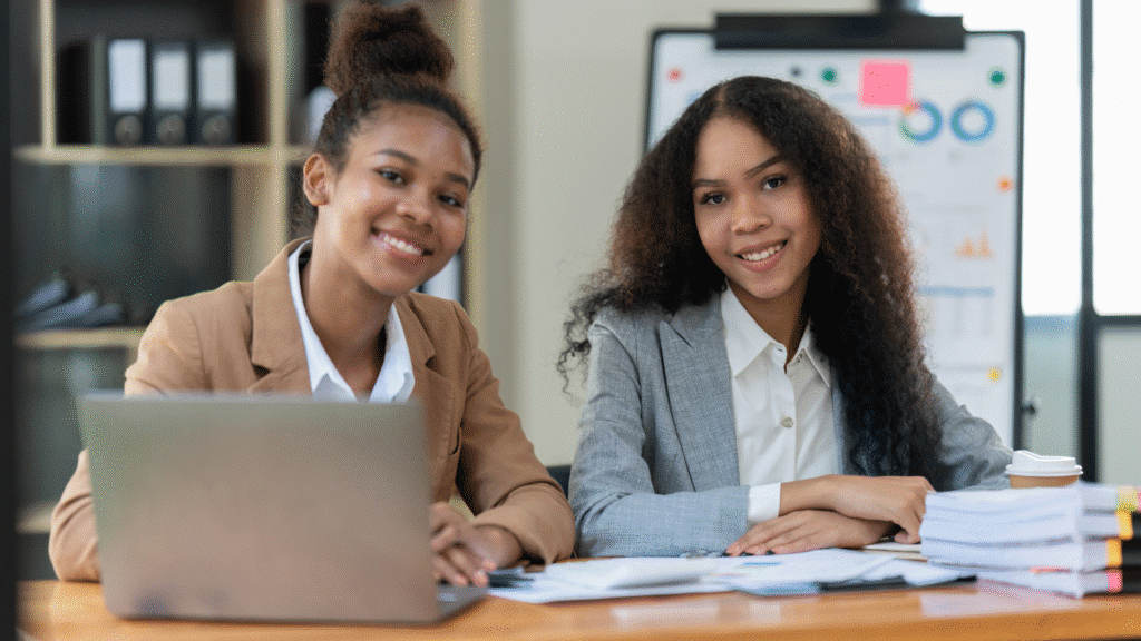 An image of two small NPO business owner who just reviewed their KPIs